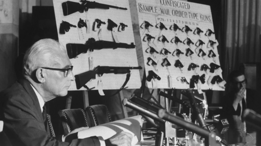 Wall of illegal guns in black and white