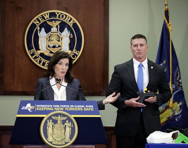 a man and woman standing at a podium