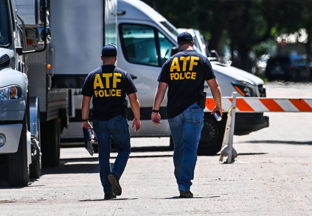 Two ATF agents walking down street