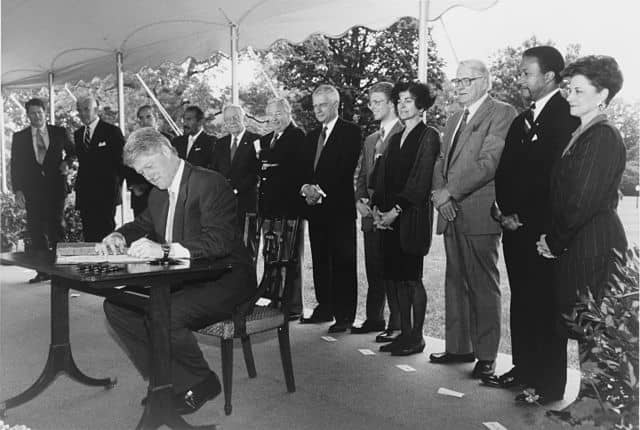 Bill Clinton signing the National Voter Registration Act