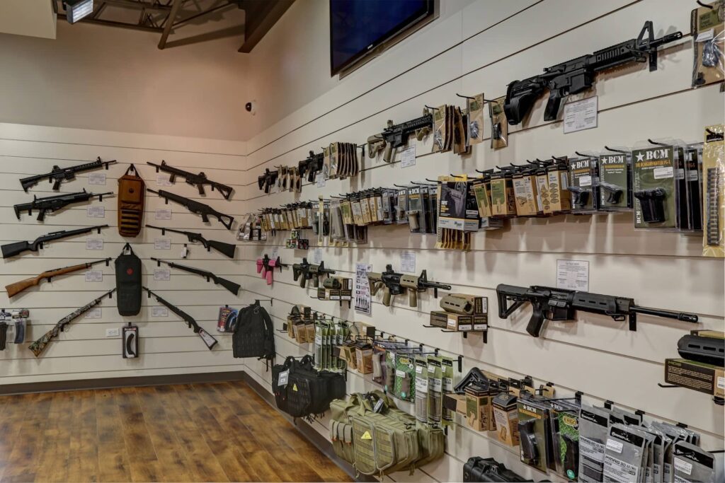 Wall of guns at a gun shop.